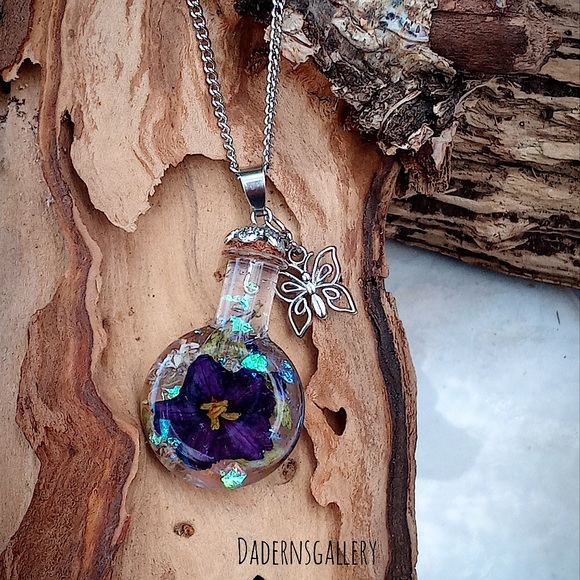 Jewelry - Handmade terrarium necklace purple dried flower capsuled in a small bottle.